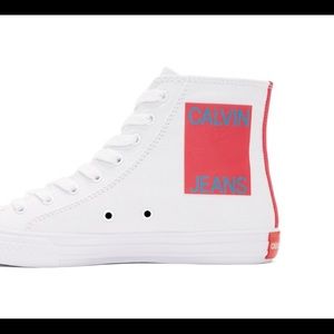 Calvin Klein Jeans white high tops sneakers with red detailing. Size 37.